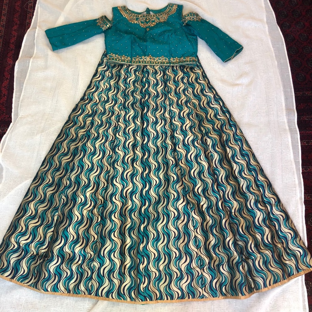 3 piece lengha with slightly of the shoulder